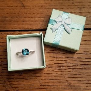 Cushion cut peacock blue topaz ring